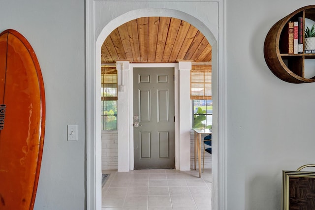 1008 SE 3rd St, Boynton Beach, FL 33435 - entrance foyer featuring tile patterned floors, wooden ceiling, and arched walkways