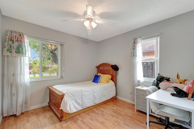 5340 SW 115th Ave, Cooper City, FL 33330 - bedroom with light wood-type flooring and a ceiling fan