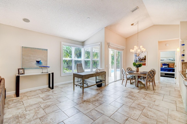 dining room featuring vaulted ceiling, an inviting chandelier, a textured ceiling, and plenty of natural light
