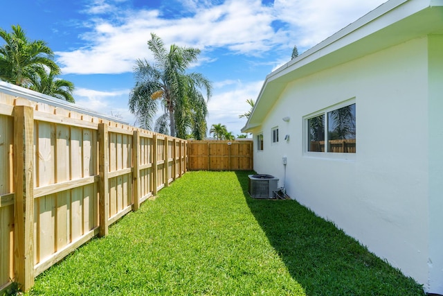 2771 NE 53rd St, Lighthouse Point, FL 33064 - view of yard with cooling unit and a fenced backyard