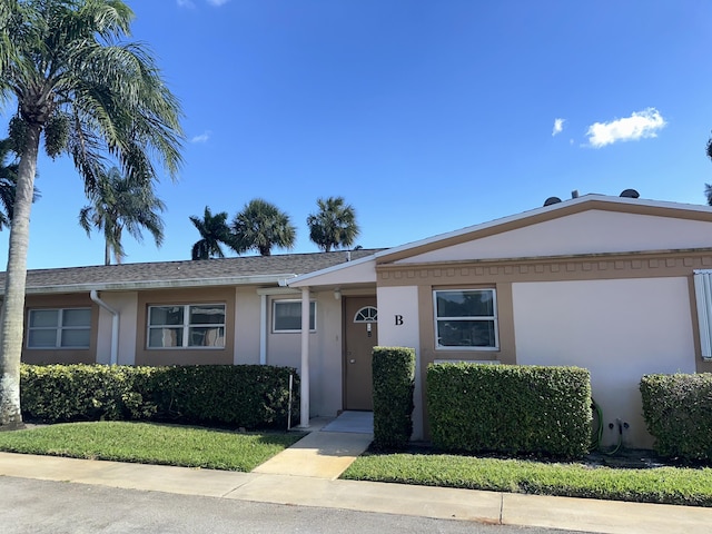 2511 W Dudley Dr Unit B, West Palm Beach, FL 33415 - single story home featuring stucco siding