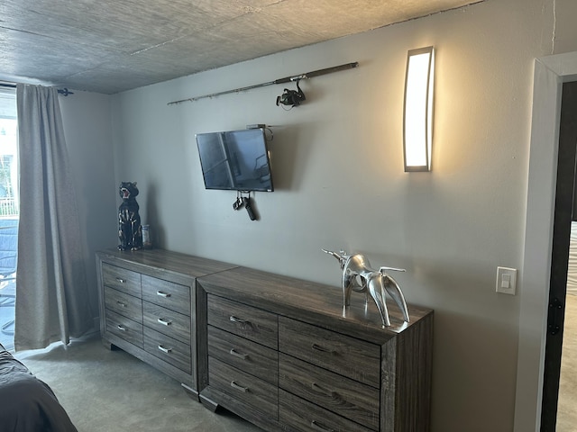 3570 S Ocean Blvd Unit 205, South Palm Beach, FL 33480 - bedroom with finished concrete flooring