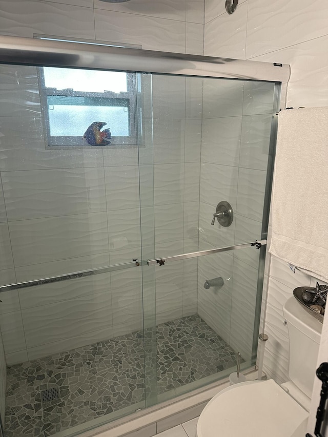3570 S Ocean Blvd Unit 205, South Palm Beach, FL 33480 - bathroom featuring toilet and a stall shower