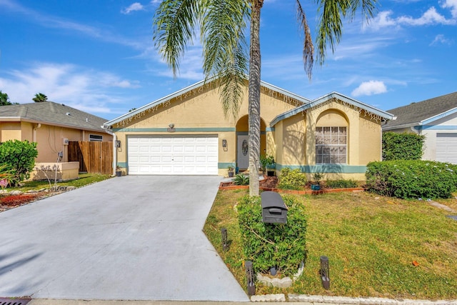 1275 Waterway Cove Dr, Wellington, FL 33414 - ranch-style house with a front lawn, driveway, fence, an attached garage, and stucco siding