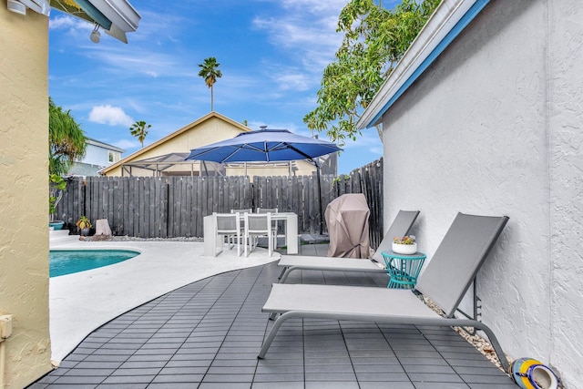 1275 Waterway Cove Dr, Wellington, FL 33414 - exterior space with a fenced backyard, a fenced in pool, and outdoor dining area