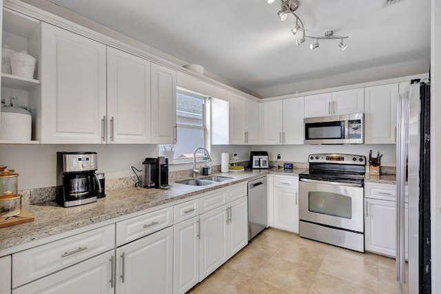 1275 Waterway Cove Dr, Wellington, FL 33414 - kitchen featuring open shelves, a sink, white cabinetry, and appliances with stainless steel finishes