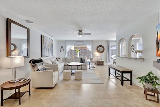 1275 Waterway Cove Dr, Wellington, FL 33414 - living area with ceiling fan, a textured ceiling, and visible vents
