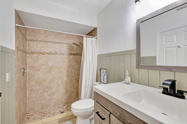 1275 Waterway Cove Dr, Wellington, FL 33414 - full bath featuring wainscoting, vanity, a shower stall, and toilet