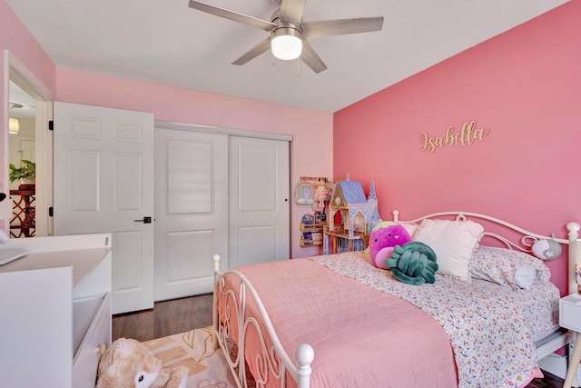 1275 Waterway Cove Dr, Wellington, FL 33414 - bedroom featuring wood finished floors, a closet, and ceiling fan