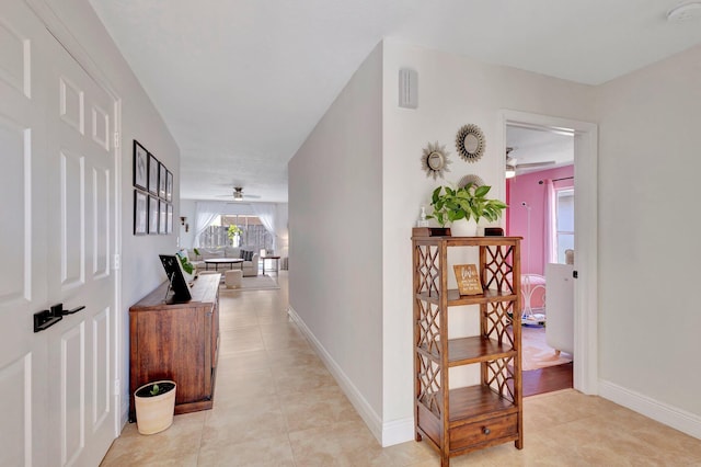 1275 Waterway Cove Dr, Wellington, FL 33414 - hall with baseboards and light tile patterned floors