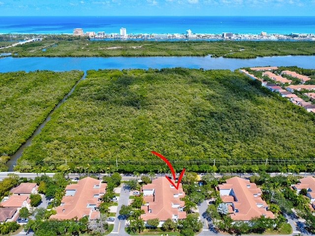 aerial view featuring a residential view and a water view