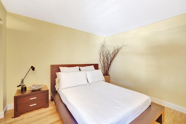 6130 Via Tierra, Boca Raton, FL 33433 - bedroom with baseboards and light wood-style flooring