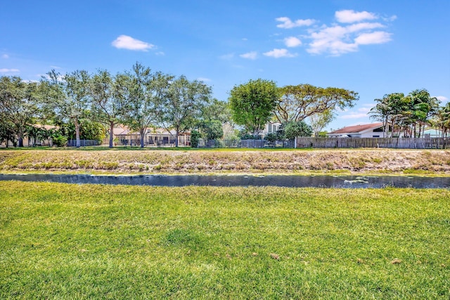 6130 Via Tierra, Boca Raton, FL 33433 - view of yard with fence and a water view
