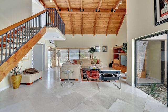 6130 Via Tierra, Boca Raton, FL 33433 - living area with beam ceiling, stairway, wooden ceiling, baseboards, and high vaulted ceiling