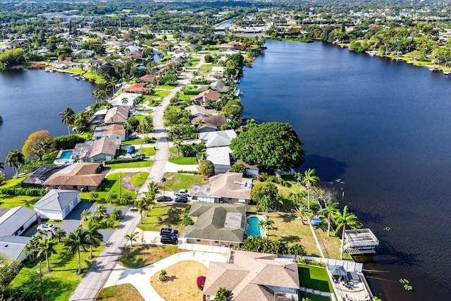 aerial view with a water view and a residential view
