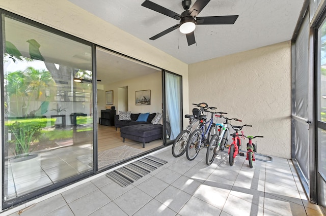 149 NW 70th St Unit 302B, Boca Raton, FL 33487 - sunroom / solarium featuring a ceiling fan