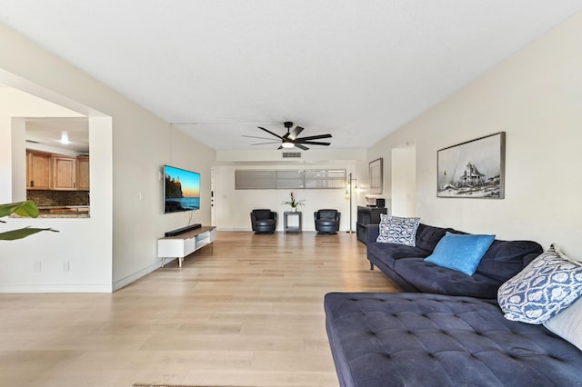149 NW 70th St Unit 302B, Boca Raton, FL 33487 - living area featuring ceiling fan, light wood-type flooring, and baseboards