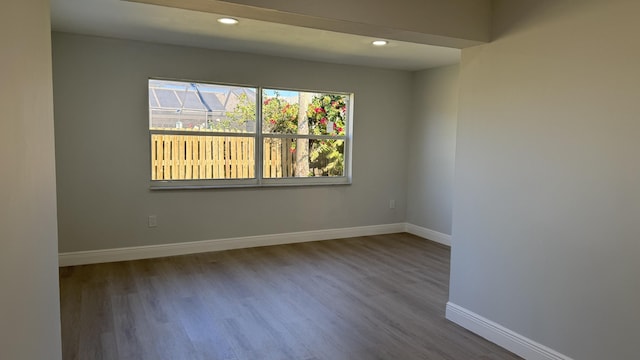 11771 NW 37th St, Sunrise, FL 33323 - spare room featuring wood finished floors, baseboards, and recessed lighting