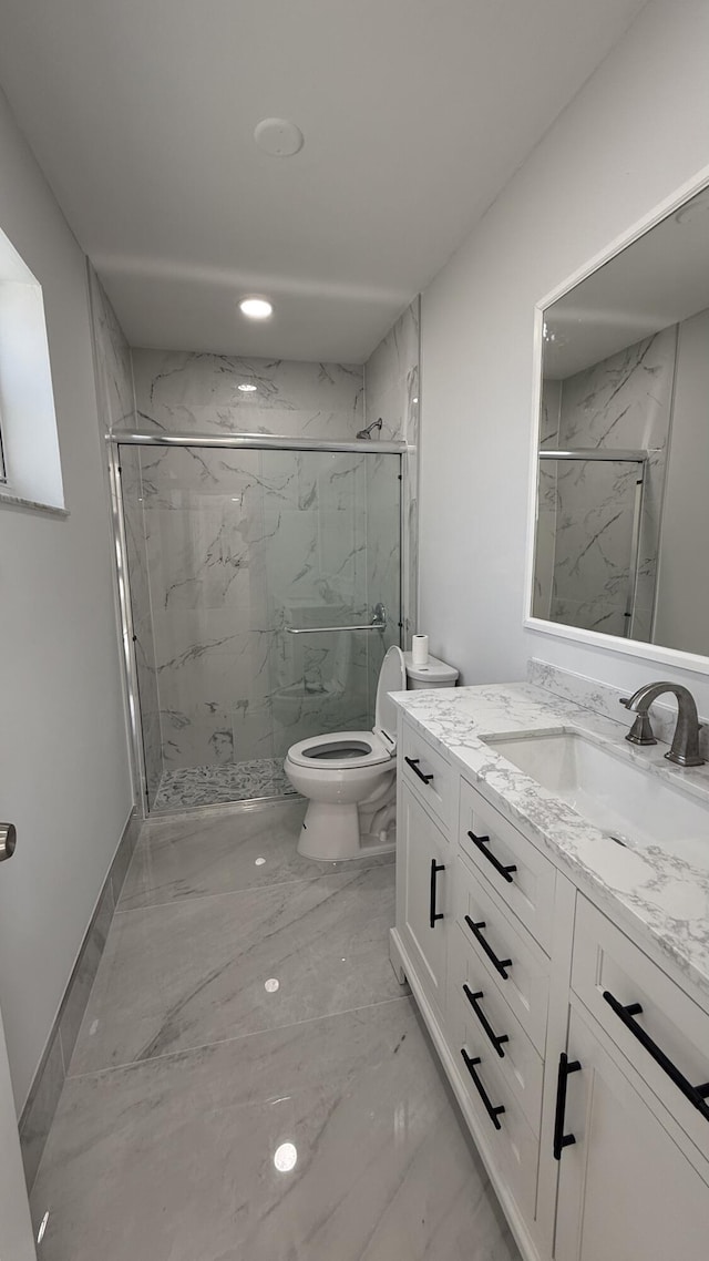 11771 NW 37th St, Sunrise, FL 33323 - bathroom featuring marble finish floor, toilet, vanity, and a marble finish shower