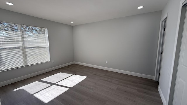 11771 NW 37th St, Sunrise, FL 33323 - unfurnished bedroom featuring baseboards, wood finished floors, and recessed lighting
