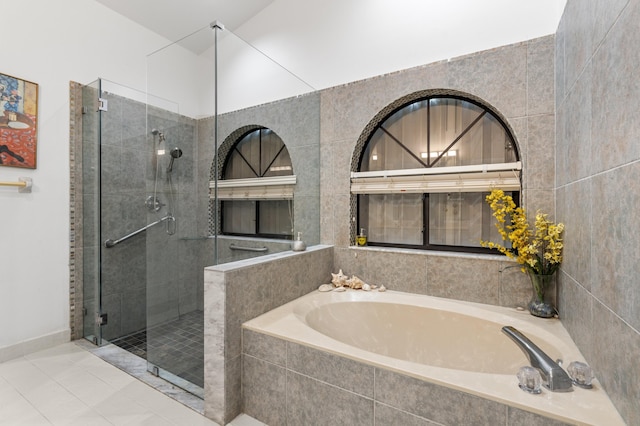 7414 Rosewood Cir, Boca Raton, FL 33487 - full bathroom with a bath, tile walls, tile patterned floors, and a stall shower