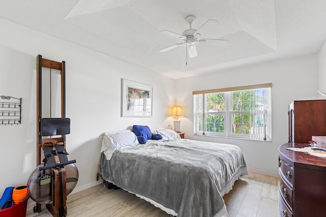7414 Rosewood Cir, Boca Raton, FL 33487 - bedroom featuring baseboards, a ceiling fan, and light wood finished floors
