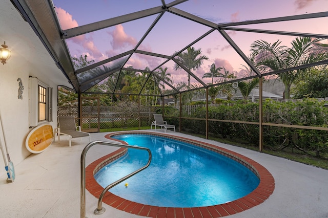 7414 Rosewood Cir, Boca Raton, FL 33487 - view of swimming pool with glass enclosure, a fenced in pool, and a patio