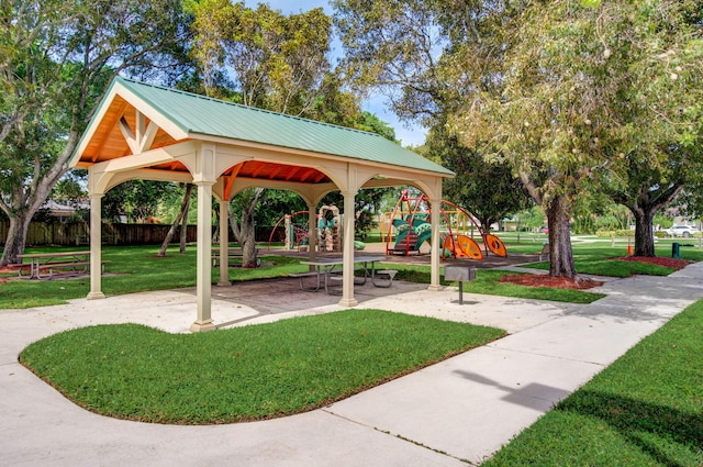 7414 Rosewood Cir, Boca Raton, FL 33487 - view of property's community featuring fence, playground community, and a yard
