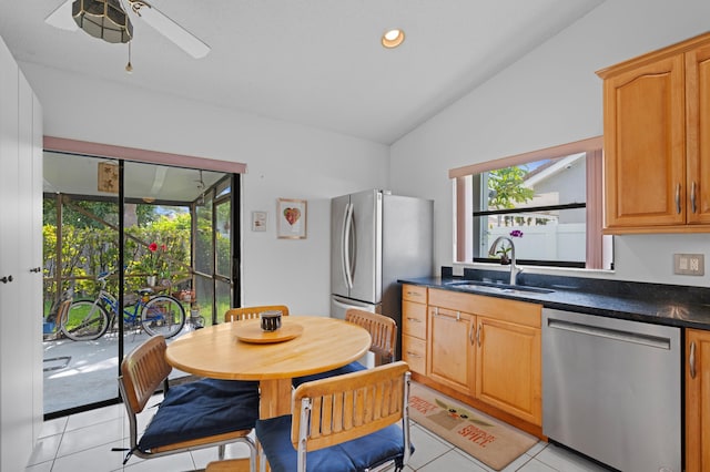 7414 Rosewood Cir, Boca Raton, FL 33487 - kitchen with a sink, dark countertops, lofted ceiling, a ceiling fan, and appliances with stainless steel finishes