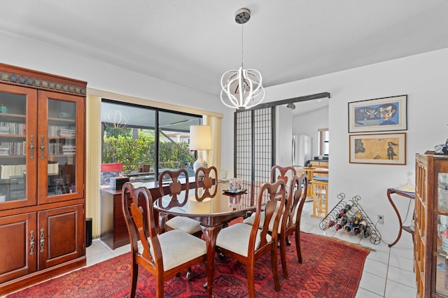 7414 Rosewood Cir, Boca Raton, FL 33487 - dining area featuring an inviting chandelier and light tile patterned floors