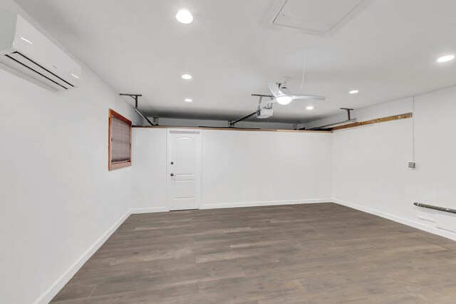 4770 Fox Hunt Trl, Boca Raton, FL 33487 - garage featuring electric water heater, a wall unit AC, washer / clothes dryer, heating unit, and a garage door opener