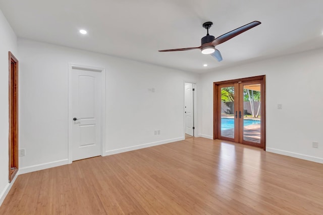 4770 Fox Hunt Trl, Boca Raton, FL 33487 - unfurnished room with french doors, light wood-type flooring, ceiling fan, baseboards, and recessed lighting