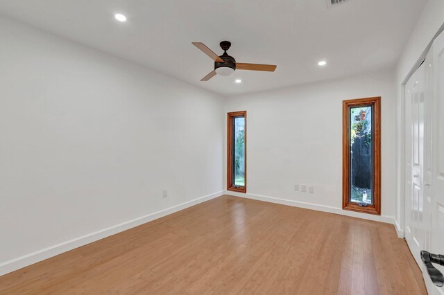 4770 Fox Hunt Trl, Boca Raton, FL 33487 - empty room with a ceiling fan, recessed lighting, baseboards, and light wood finished floors