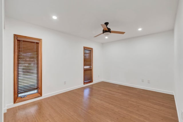 4770 Fox Hunt Trl, Boca Raton, FL 33487 - empty room with a ceiling fan, light wood-style flooring, recessed lighting, and baseboards