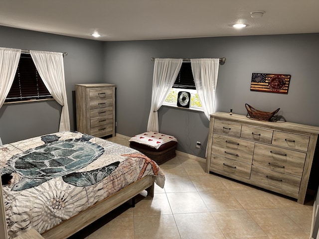 1672 Thumb Point Dr, Fort Pierce, FL 34949 - bedroom with baseboards, recessed lighting, and light tile patterned flooring