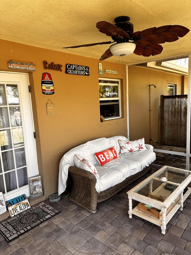 1672 Thumb Point Dr, Fort Pierce, FL 34949 - exterior space featuring a ceiling fan, a textured ceiling, and brick floor