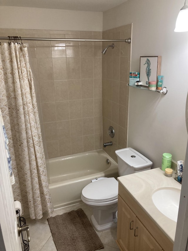 1672 Thumb Point Dr, Fort Pierce, FL 34949 - bathroom with tile patterned floors, vanity, toilet, and shower / bathtub combination with curtain