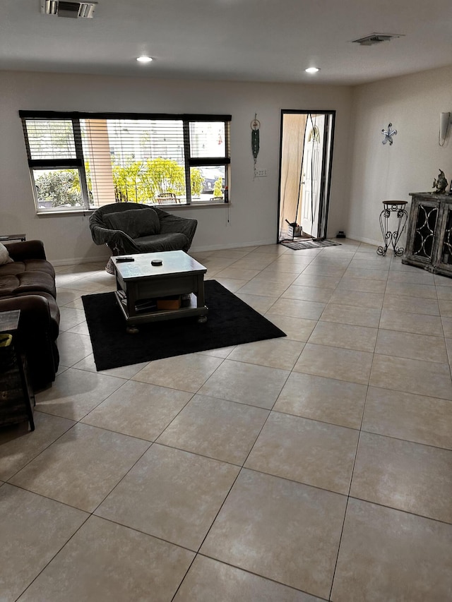 1672 Thumb Point Dr, Fort Pierce, FL 34949 - living area with recessed lighting, visible vents, and a wealth of natural light
