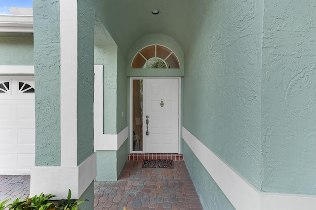 23437 Torre Cir, Boca Raton, FL 33433 - entrance to property with a garage and stucco siding
