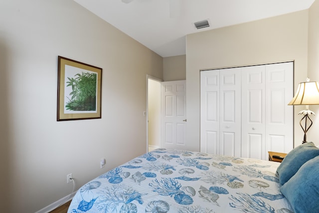 23437 Torre Cir, Boca Raton, FL 33433 - bedroom with a closet and a ceiling fan