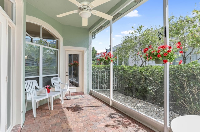 23437 Torre Cir, Boca Raton, FL 33433 - sunroom with a ceiling fan