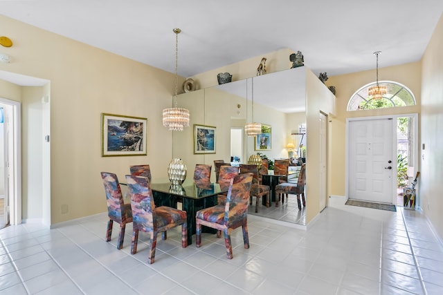 23437 Torre Cir, Boca Raton, FL 33433 - dining space featuring a chandelier and light tile patterned floors