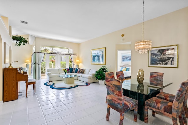 23437 Torre Cir, Boca Raton, FL 33433 - dining area featuring a chandelier, french doors, and light tile patterned floors