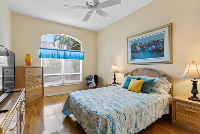 23437 Torre Cir, Boca Raton, FL 33433 - bedroom with wood finished floors and ceiling fan