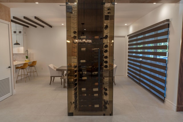 2810 F Rd, Loxahatchee Groves, FL 33470 - wine area featuring tile patterned floors, recessed lighting, and beamed ceiling