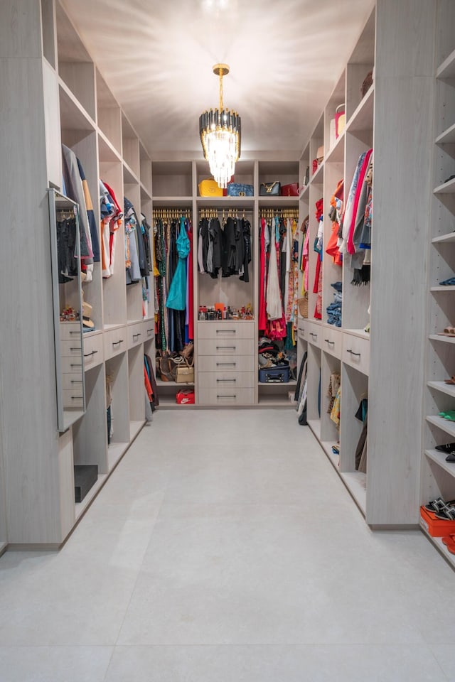 2810 F Rd, Loxahatchee Groves, FL 33470 - spacious closet featuring a chandelier