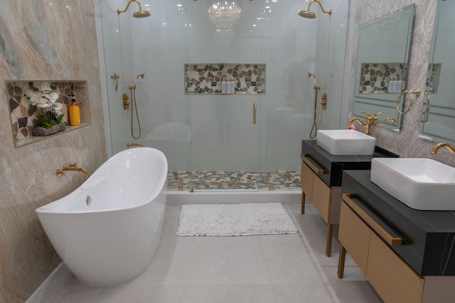 2810 F Rd, Loxahatchee Groves, FL 33470 - bathroom with a stall shower, double vanity, a freestanding tub, and tile walls