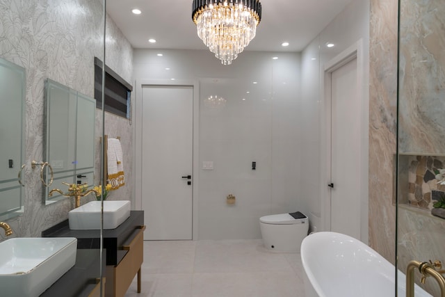 2810 F Rd, Loxahatchee Groves, FL 33470 - full bathroom with tile walls, a soaking tub, double vanity, a chandelier, and recessed lighting
