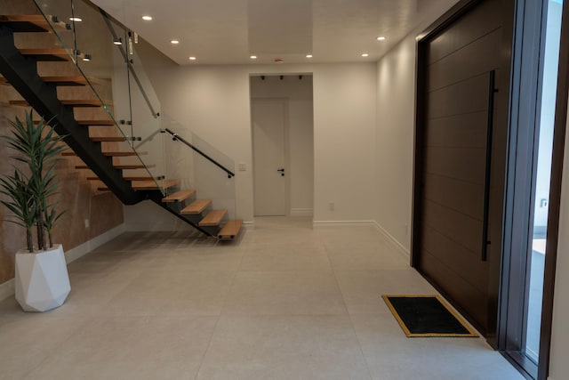 2810 F Rd, Loxahatchee Groves, FL 33470 - entryway featuring recessed lighting, stairs, and light tile patterned flooring