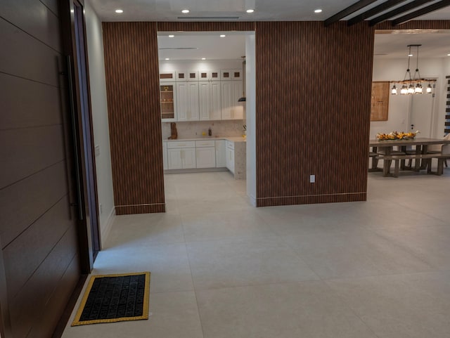 2810 F Rd, Loxahatchee Groves, FL 33470 - hall with recessed lighting, a chandelier, and light tile patterned flooring